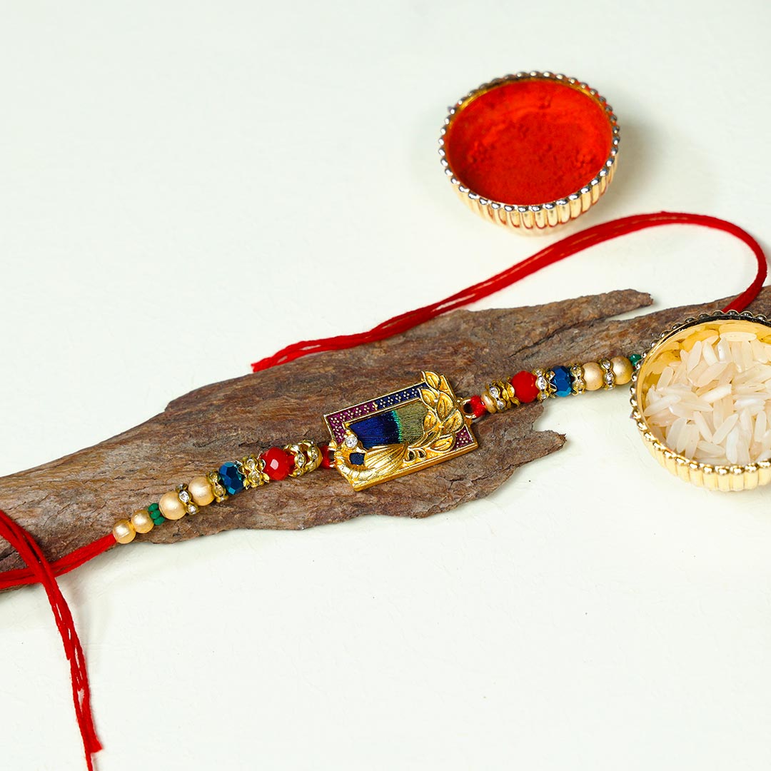 Vibrant Mauli Rakhi with Assorted Dry Fruits box